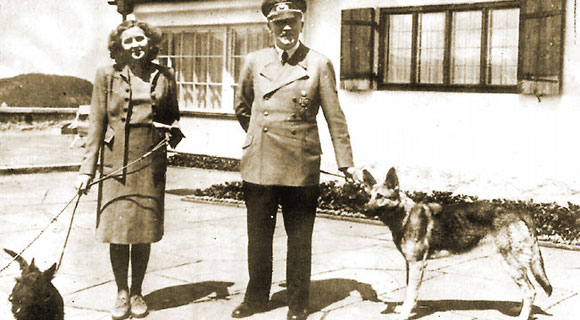 Adolf Hitler and Eva Braun with their dogs Blondi and Bella
